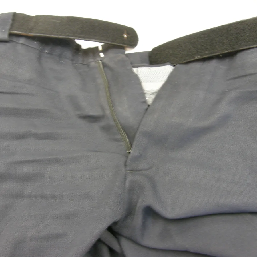 Photograph of the open fly of Daniel’s navy uniform pants with the belt in place, taken June 20, 2014. No stain is visible.